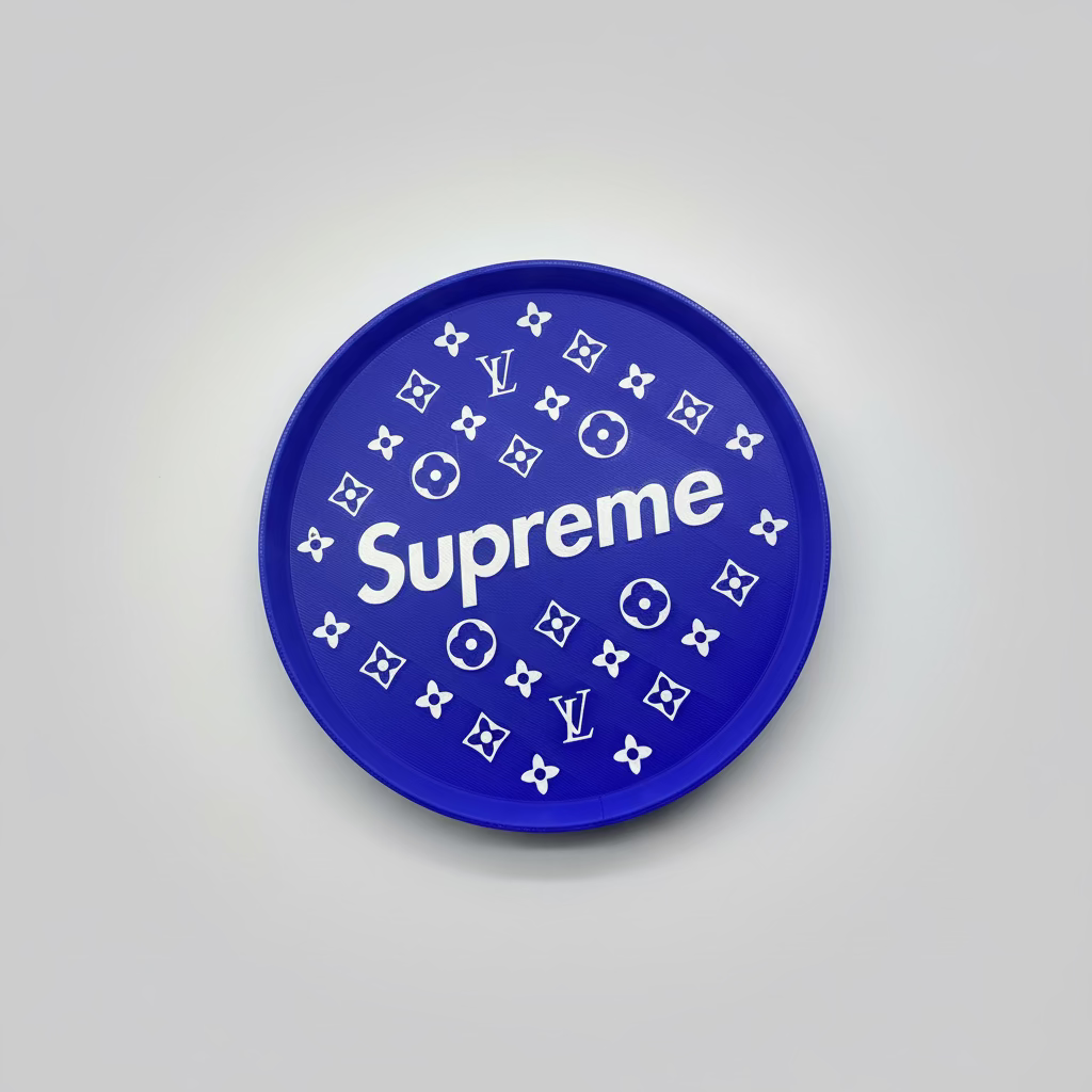 Blue disc with 'Supreme' branding and Louis Vuitton pattern on a dark background