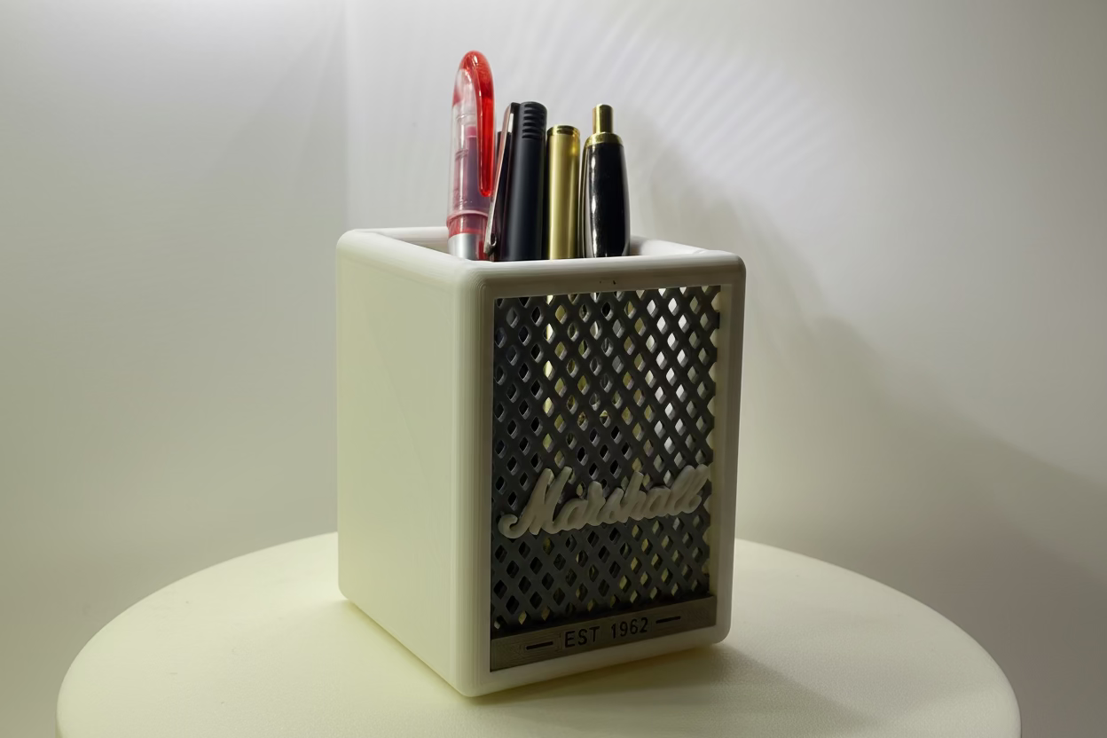 Marshall speaker-shaped pen holder with pens inside on a white background
